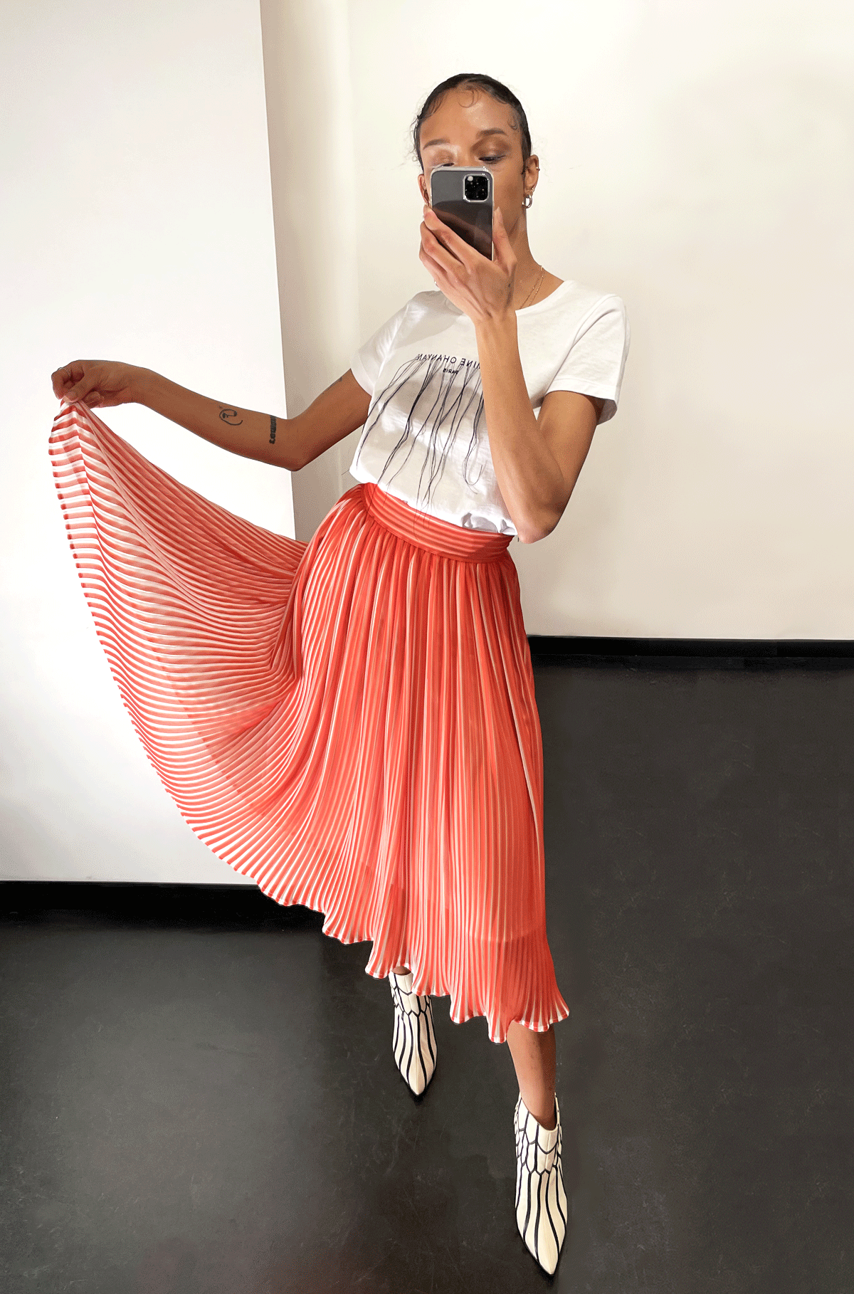 No Season orange pleated skirt on pre-order